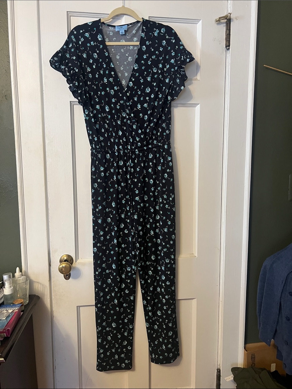 Cece Women's Navy Floral Jumpsuit with V-Neck and drawstring waist S